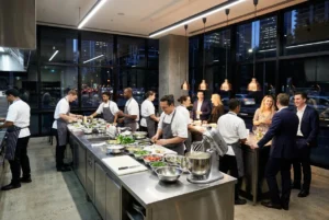 Busy Sydney dessert kitchen with staff preparing whipped cream